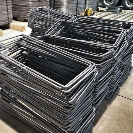 Estribos retangulares dobrados conforme projeto